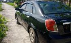 Daewoo Lacetti 2009 - Cần bán xe Daewoo Lacetti 2009, màu đen