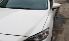 Mazda 6 At 2015 - Cần bán gấp Mazda 6 At sản xuất năm 2015, màu trắng, giá chỉ 735 triệu
