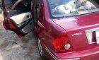 Ford Laser Ghia 1.8 MT 2003 - Chính chủ bán ô tô Ford Laser Ghia 1.8 MT 2003, màu đỏ