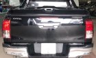 Toyota Hilux 3.0G 4x4 AT 2016 - Bán ô tô Toyota Hilux XLS AT sản xuất năm 2016, màu đen