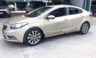 Kia K3 2014 - Cần bán gấp Kia K3 năm sản xuất 2014, màu vàng