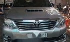 Toyota Fortuner 2016 - Cần bán gấp Toyota Fortuner sản xuất năm 2016, màu bạc, giá 890tr