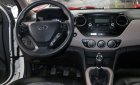 Hyundai Grand i10 1.2MT 2015 - Bán Hyundai Grand i10 1.2MT năm 2015, màu trắng, xe nhập