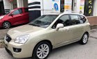 Kia Carens SXAT 2011 - Bán Kia Carens SXAT 2011, màu vàng