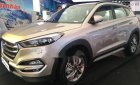 Hyundai Tucson    2.0 AT 2WD 2018 - Bán xe Hyundai Tucson 2.0 AT 2WD năm 2018, màu ghi vàng 