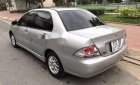 Mitsubishi Lancer    2004 - Bán xe Mitsubishi Lancer đời 2004, màu bạc ít sử dụng giá cạnh tranh