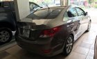 Hyundai Accent   1.4  2014 - Cần bán gấp Hyundai Accent 1.4 năm 2014, màu nâu