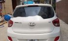 Hyundai Grand i10  1.2 AT 2015 - Cần bán Hyundai Grand i10 1.2 AT sản xuất năm 2015, màu trắng mới chạy 18.000 km giá cạnh tranh