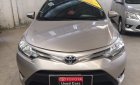 Toyota Vios E 2015 - Cần bán xe Toyota Vios E số sàn đời 2015, màu nâu vàng