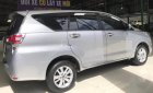 Toyota Innova 2.0E 2016 - Cần bán gấp Toyota Innova 2.0E đời 2016, màu bạc như mới, 695 triệu