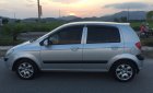 Hyundai Getz 2010 - Cần bán gấp Hyundai Getz sản xuất 2010, màu bạc như mới