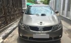 Kia Forte 2011 - Bán Kia Forte đời 2011, màu vàng cát