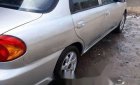 Kia Spectra 2004 - Cần bán xe Kia Spectra sản xuất 2004, màu bạc