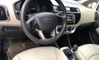 Kia Rio 1.4 MT 2015 - Cần bán xe Kia Rio 1.4MT đời 2015, màu trắng, xe nhập  