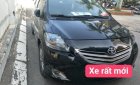 Toyota Vios 1.5 E 2013 - Cần bán gấp Toyota Vios 1.5 E đời 2013, màu đen số sàn, 388tr