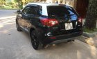 Suzuki Vitara 2016 - Bán xe Suzuki Vitara màu đen, nóc trắng đời 2016 đăng ký 06/2017