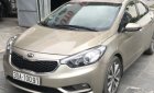 Kia K3   1.6 MT  2014 - Bán Kia K3 1.6 MT năm 2014, màu vàng cát