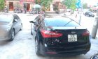 Kia K3 1.6AT 2014 - Cần bán xe Kia K3 1.6AT năm sản xuất 2014, màu đen