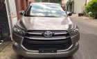 Toyota Innova   E 2016 - Cần bán Toyota Innova E năm 2016, màu nâu xe gia đình