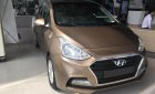 Hyundai Grand i10 1.2 MT  2018 - Bán xe Hyundai Grand i10 1.2 MT sedan đời 2018, màu vàng cát, 390tr giao ngay