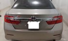 Toyota Camry 2.0E 2014 - Bán xe Toyota Camry 2.0E 2014, màu vàng số tự động, giá tốt