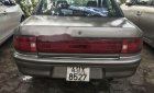Mazda 323 1995 - Bán Mazda 323 sản xuất 1995, màu nâu 