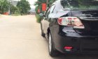 Toyota Corolla altis 1.8G MT 2012 - Cần bán Toyota Corolla Altis 1.8G MT năm 2012, màu đen số sàn, giá 510tr