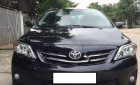 Toyota Corolla altis 1.8G MT 2012 - Cần bán Toyota Corolla Altis 1.8G MT năm 2012, màu đen số sàn, giá 510tr