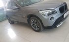 BMW X1 sDrive18i 2010 - Bán xe BMW X1 sDrive18i đời 2010, màu bạc, xe nhập  