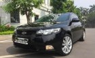 Kia Cerato 1.6 2010 - Bán Kia Cerato 1.6 năm sản xuất 2010, màu đen, nhập khẩu nguyên chiếc số tự động