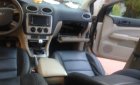 Ford Focus 2005 - Bán ô tô Ford Focus sản xuất năm 2005, màu vàng