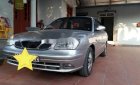 Daewoo Nubira 1.6 2003 - Bán Daewoo Nubira 1.6 đời 2003, màu bạc xe gia đình, 110tr