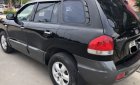 Hyundai Santa Fe   2.0 AT  2005 - Bán Hyundai Santa Fe 2.0 AT 2005, màu đen chính chủ, giá tốt