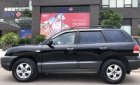 Hyundai Santa Fe   2.0 AT  2005 - Bán Hyundai Santa Fe 2.0 AT 2005, màu đen chính chủ, giá tốt