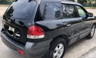 Hyundai Santa Fe   2.0 AT  2005 - Bán Hyundai Santa Fe 2.0 AT 2005, màu đen chính chủ, giá tốt