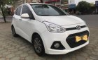 Hyundai Grand i10 1.0 Mt 2014 - Bán xe Hyundai Grand i10 1.0 MT, Sx cuối 2014 đăng ký 2015, màu trắng, xe nhập khẩu, hỗ trợ trả góp 70% giá xe