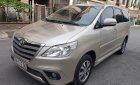 Toyota Innova E 2015 - Bán ô tô Toyota Innova E năm sản xuất 2015, màu vàng số sàn