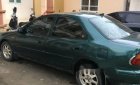 Mazda 323 1999 - Bán xe Mazda 323 đời 1999, màu xanh