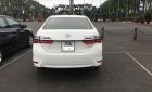 Toyota Corolla altis E CVT 2018 - Cần bán gấp Toyota Corolla Altis E CVT đời 2018, màu trắng số tự động, giá 725tr