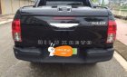 Toyota Hilux   3.0 AT  2016 - Bán Toyota Hilux 3.0 AT 2016, màu đen, giá tốt