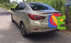 Mazda 2  1.5AT 2016 - Bán Mazda 2 1.5AT sản xuất 2016, màu vàng xe gia đình