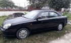 Daewoo Nubira 2002 - Bán Daewoo Nubira đời 2002, màu đen còn mới, giá 95tr