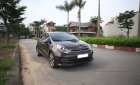 Kia Rio 1.4 GAT 2016 - Bán Kia Rio Hatchback 2016 tự động, màu nâu, xe zin nguyên bản đẹp