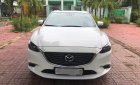 Mazda 6 2.5AT Premium 2017 - Bán Mazda 6 2.5AT Premium màu trắng, số tự động, sản xuất T6/2017, bản facelift. Lăn bánh 18000km