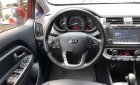 Kia Rio 1.4 AT  2014 - Bán Kia Rio 1.4 AT sản xuất năm 2014, màu đỏ, xe nhập