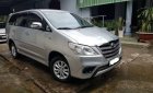 Toyota Innova  2.0E  2014 - Cần bán gấp Toyota Innova 2.0E đời 2014, màu bạc xe gia đình