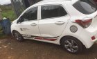 Hyundai Grand i10   1.0MT 2014 - Cần bán gấp Hyundai Grand i10 1.0MT sản xuất năm 2014, màu trắng  