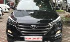 Hyundai Tucson 1.6 Turbo  2016 - Bán Hyundai Tucson 1.6 Turbo năm 2016, màu đen, giá 940tr