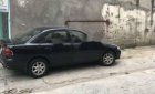 Mazda 323   1999 - Bán xe Mazda 323 đời 1999, màu đen xe gia đình