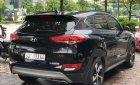 Hyundai Tucson 1.6 Turbo  2016 - Bán Hyundai Tucson 1.6 Turbo năm 2016, màu đen, giá 940tr